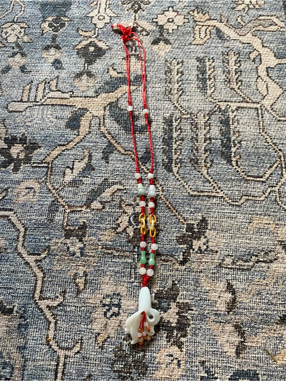 Red Beaded Necklace with White Flower Jade Pendant